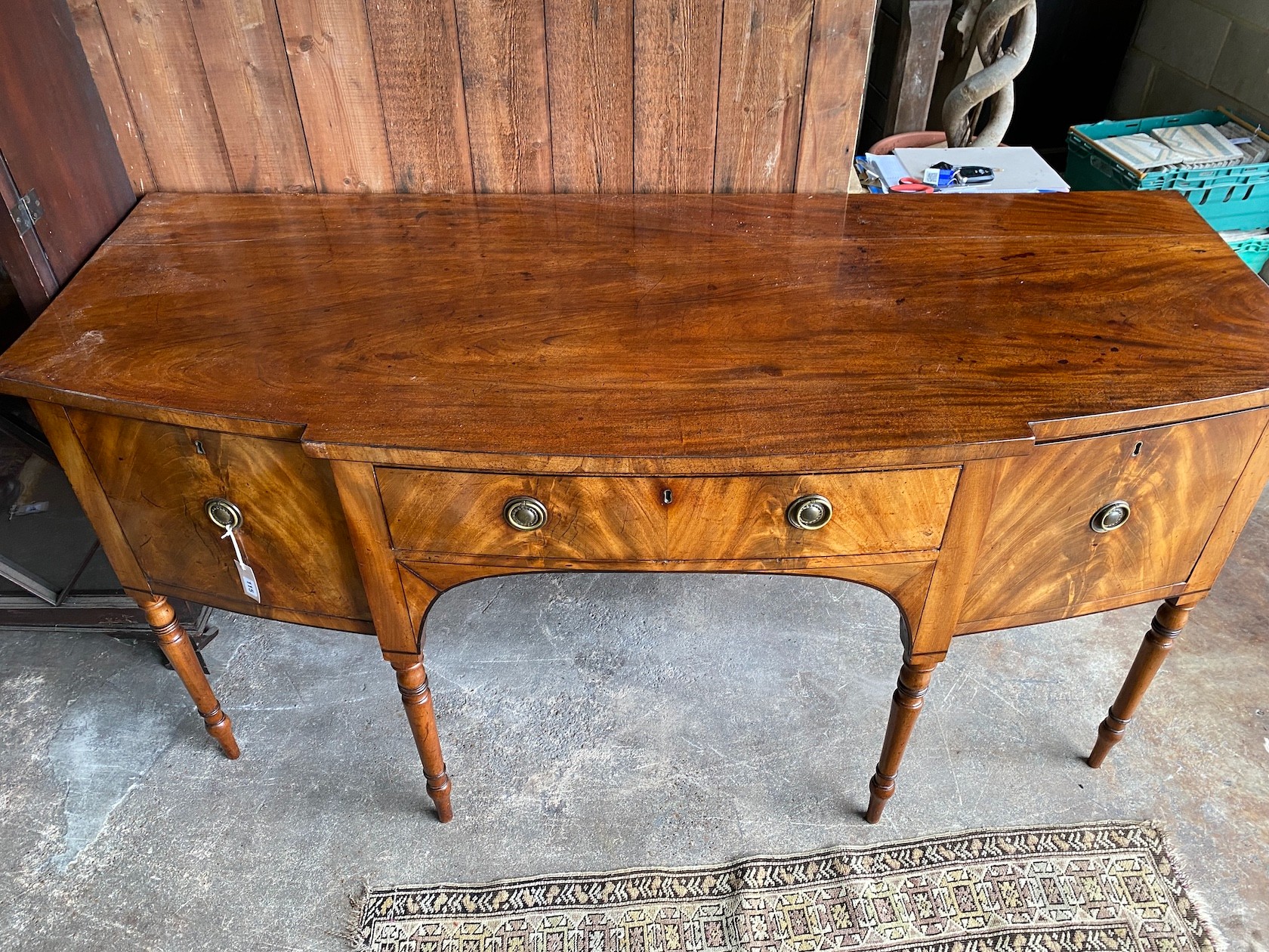 A Regency mahogany bowfront sideboard, length 184cm, depth 75cm, height 93cm